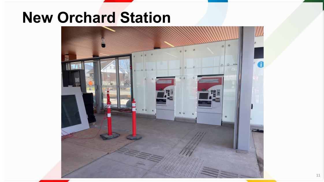 Photo of New Orchard station's interior showing fare machines not turned on and other components I can't identify